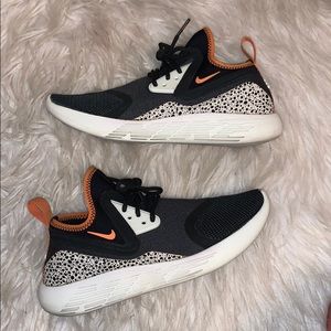 Nike orange and black shoe